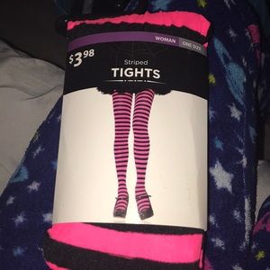 Woman 1 size fits all Halloween pink and black striped tights